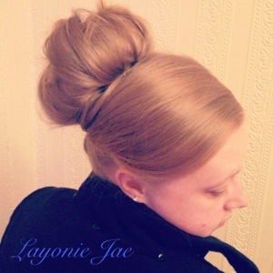 Hairstyle by Layonie jae using a hair donut